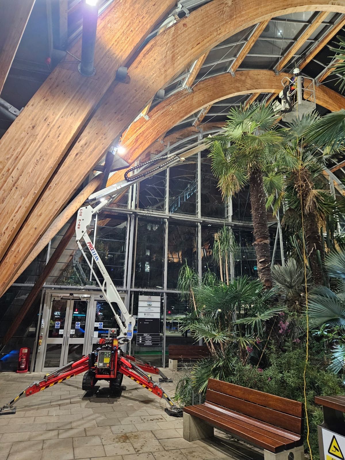 ProClean Access spider platform working at height inside large commercial venue