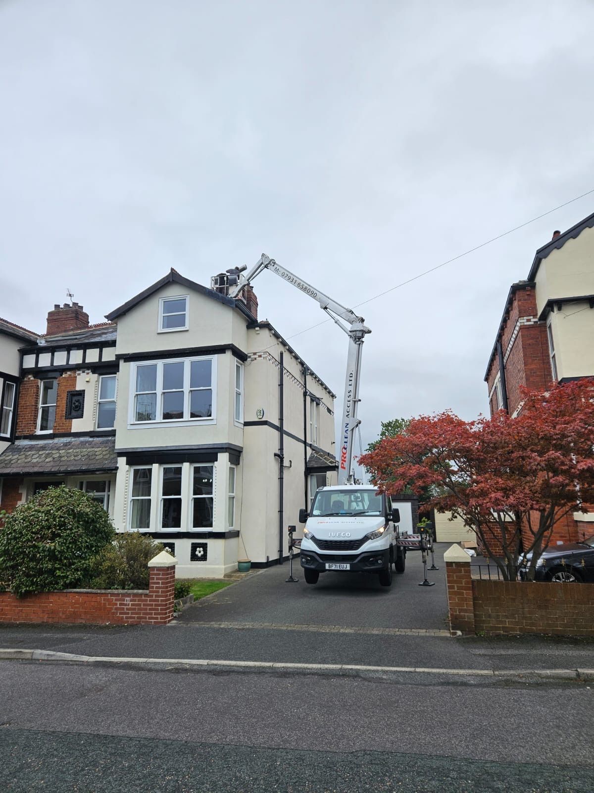 ProClean Access truck-mounted cherry picker at Victorian semi-detached property